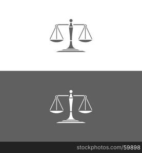 Scales of justice icon on white and dark backgrounds