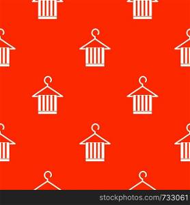 Scarf on a coat hanger pattern repeat seamless in orange color for any design. Vector geometric illustration. Scarf on a coat hanger pattern seamless