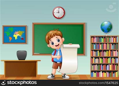 Schoolboy holding paper in a classroom