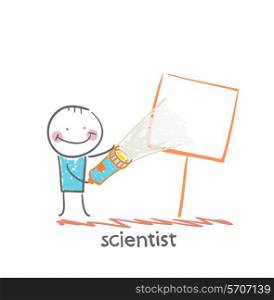 scientist shines a flashlight on a poster