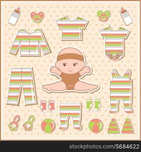 Scrapbook elements with baby clothes