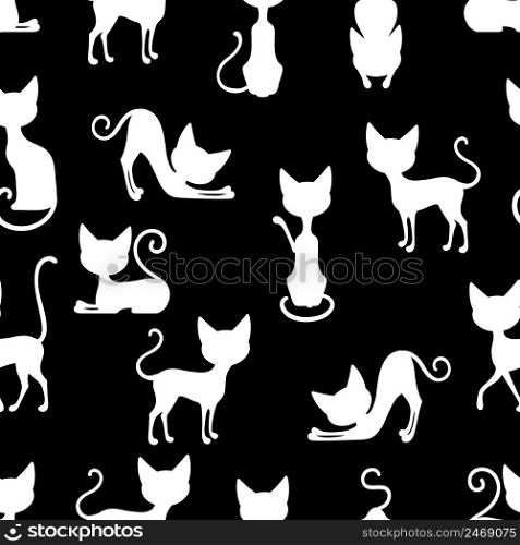 Seamless black background pattern with white silhouettes of cats stretching sitting and playing vector illustration. White Cats Seamless Pattern