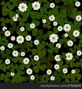 Seamless clover leaves and flowers pattern on black background at Patrick&rsquo;s Day