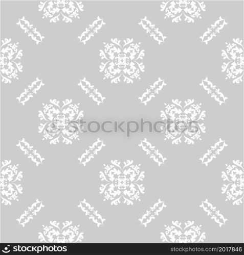 Seamless damask white pattern on gray background. Modern arabic pattern. Vector pattern with ornament. Background, wallpaper, wrapping, textile template.. Seamless damask white pattern on gray background.