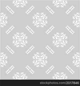 Seamless damask white pattern on gray background. Modern arabic pattern. Vector pattern with ornament. Background, wallpaper, wrapping, textile template.. Seamless damask white pattern on gray background.