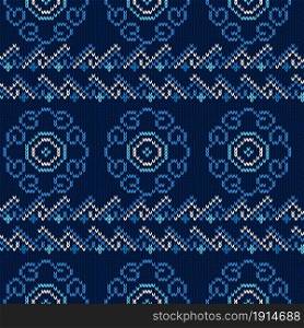 Seamless knitted vector pattern as a fabric texture in dark blue and white hues