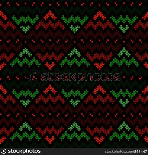 Seamless knitting geometrical vector pattern with zigzag lines in green, brown and orange hues as a knitted fabric texture