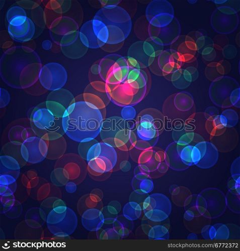 seamless pattern of colored spots on dark background with space for text