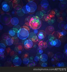 seamless pattern of colored spots on dark background with space for text