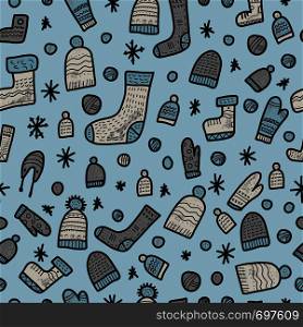 Seamless pattern of warm socks, beanies, gloves. Endless background. Vector illustration.