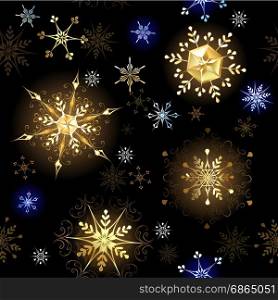 seamless pattern with gold and blue snowflakes on a black background.