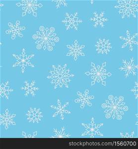 Seamless pattern with winter snowflakes. Hand drawn snow texture. Vector illustration in doodle style on blue background. Seamless pattern with winter snowflakes. Hand drawn snow texture. Vector illustration