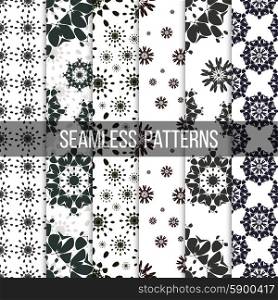 Seamless patterns with abstract flowers. Repeating modern stylish geometric backgrounds. Simple black monochrome vector textures.. Seamless patterns with abstract flowers. Repeating modern stylish geometric backgrounds. Simple black monochrome vector textures