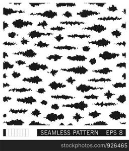Seamless spotted pattern. Vector black and white grunge strokes and smudges. Painterly texture with tribal motifs.. Seamless grunge spotted pattern