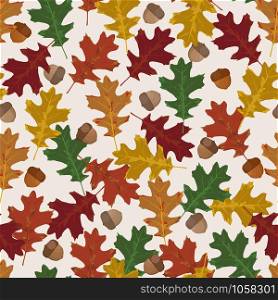 Seamless vector pattern with autumn leaves in seasonal colors. Oak leaf and acorn on white background