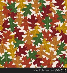 Seamless vector pattern with autumn leaves in seasonal colors. Oak leaf on white background