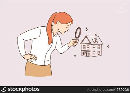 Searching for new house and real estate concept. Young positive business woman standing using magnifying glass zooming to see house or residential building details for making deal . Searching for new house and real estate concept
