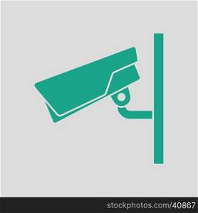 Security camera icon. Gray background with green. Vector illustration.