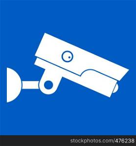 Security camera icon white isolated on blue background vector illustration. Security camera icon white