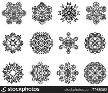 Set of 12 Circle Ornaments in Shape of Snowflakes.