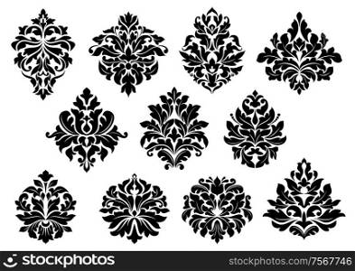 Set of black and white vector silhouette floral and foliate arabesque motifs suitable for damask style interior decor design elements