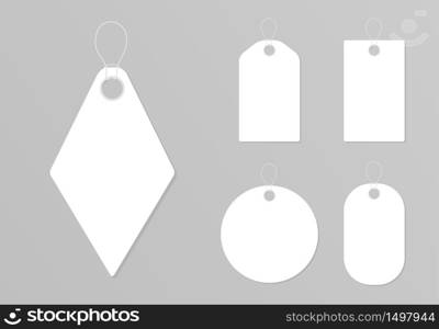 Set of blank gift tag labels for sale prices. White colors kraft carton paper material with a rope. Stickers of different round, square, rectangular and rhomboid shapes