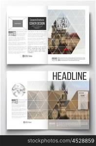 Set of business templates for brochure, magazine, flyer, booklet or annual report. Polygonal background, blurred image, urban landscape, Prague cityscape, modern triangular texture. Set of business templates for brochure, magazine, flyer, booklet or annual report. Polygonal background, blurred image, urban landscape, cityscape of Prague, modern triangular texture