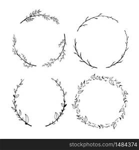 Set of cute detailed hand drawn floral wreaths on white. Set of cute detailed hand drawn floral wreaths isolated on white