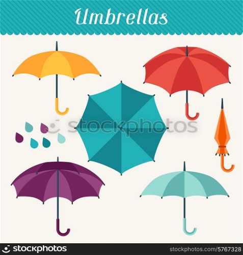 Set of cute multicolor umbrellas in flat design style.