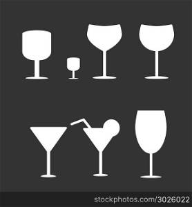 Set of different wine-glass silhouettes of goblets isolated on dark background.. Set of different wine-glass silhouettes of goblets isolated on background.
