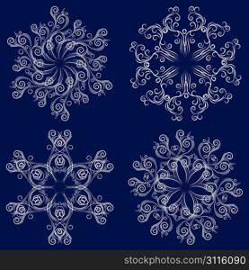 Set of four christmas motif openwork snowflakes