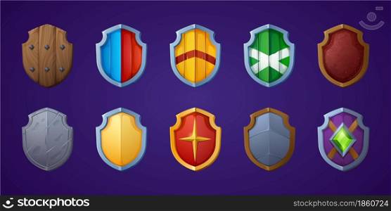 Set of game shields, cartoon fantasy medieval armor of metal and wood. Knight ammo, iron or wooden guard collection, ui design elements, military screens front view isolated vector icons, clipart. Set of game shields cartoon fantasy medieval armor