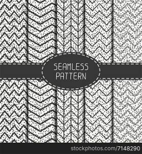Set of geometric abstract chevron zigzag stripes pattern. Hipster striped. Wrapping paper. Scrapbook paper. Vector illustration. Background. Graphic texture with randomly disposed spots.. Set of geometric abstract chevron zigzag stripes pattern. Vintage hipster striped. Wrapping paper. Scrapbook paper. Vector illustration. Background. Graphic texture with randomly disposed spots.