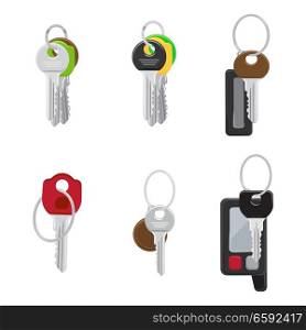 Set of modern door and car keys with trinket on keyring and remote alarm flat vectors isolated on white background. House and vehicle keys illustrations collection for real estate and auto concepts. Set of Modern Door and Car Keys Flat Vectors