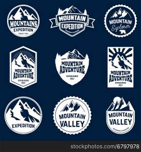 Set of mountains, hiking and outdoor adventures emblems.
