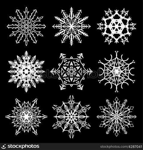 Set of nine beautiful drawn snowflake silhouettes