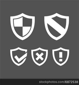 Set of protection shield icons on a dark background