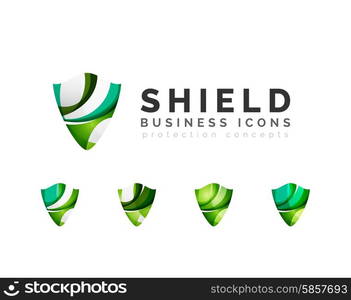 Set of protection shield logo concepts. Set of protection shield logo concepts. Color flowing wave design icons on white