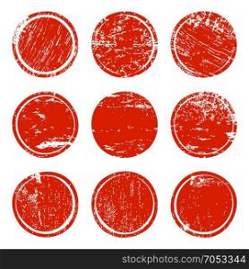 Set of red grunge texture circles. Red grunge texture circles isolated on white background. Set of blank post stamp, banner, logo, badge and label template. Vector illustration.