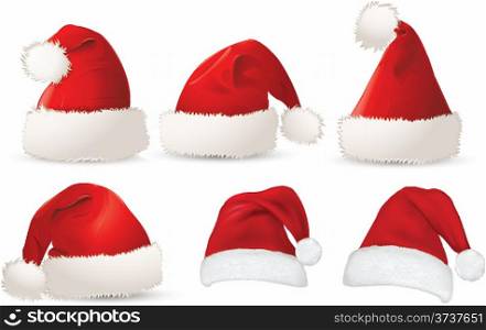 Set of red Santa Claus hats isolated on white background