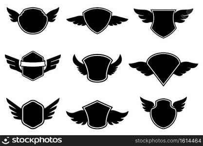 Set of the empty emblems with wings. Design element for logo, label, sign. badge. Vector illustration