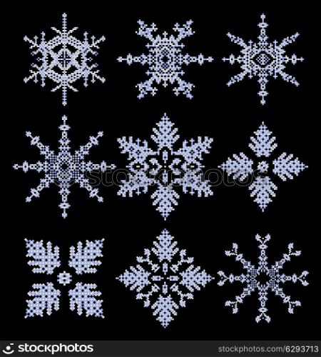 Set of vector snowflakes on a black background