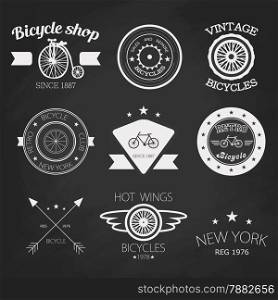 Set of vintage bike shop logos. White logo on black chalk board.
