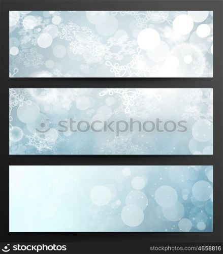 Set Of Winter Festive Abstract Snowflakes Blue Banners With Light