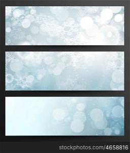 Set Of Winter Festive Abstract Snowflakes Blue Banners With Light