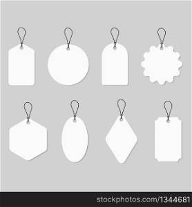 Set white labels in different shapes with string isolated on grey background. Blank card and sticker. Tags for price, gift, discount, luggage or sale. Paper mockup for shop, promotion, banner. Vector.. Set white labels in different shapes with string isolated on grey background. Blank card and sticker. Tags for price, gift, discount, luggage or sale. Paper mockup for shop, promotion, banner. Vector