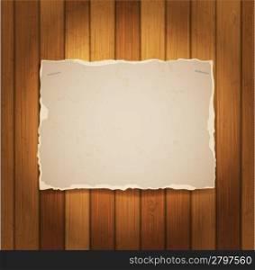 sheet of cardboard on a wood boards