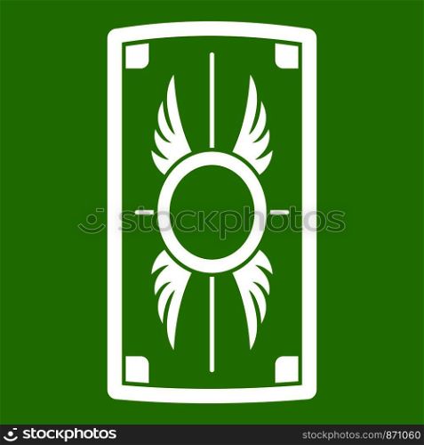 Shield with ornament icon white isolated on green background. Vector illustration. Shield with ornament icon green