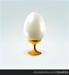 Shining glossy pearl egg standing on a golden yellow stander over light background