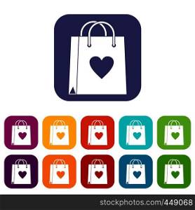 Shopping bag icons set vector illustration in flat style In colors red, blue, green and other. Shopping bag icons set flat